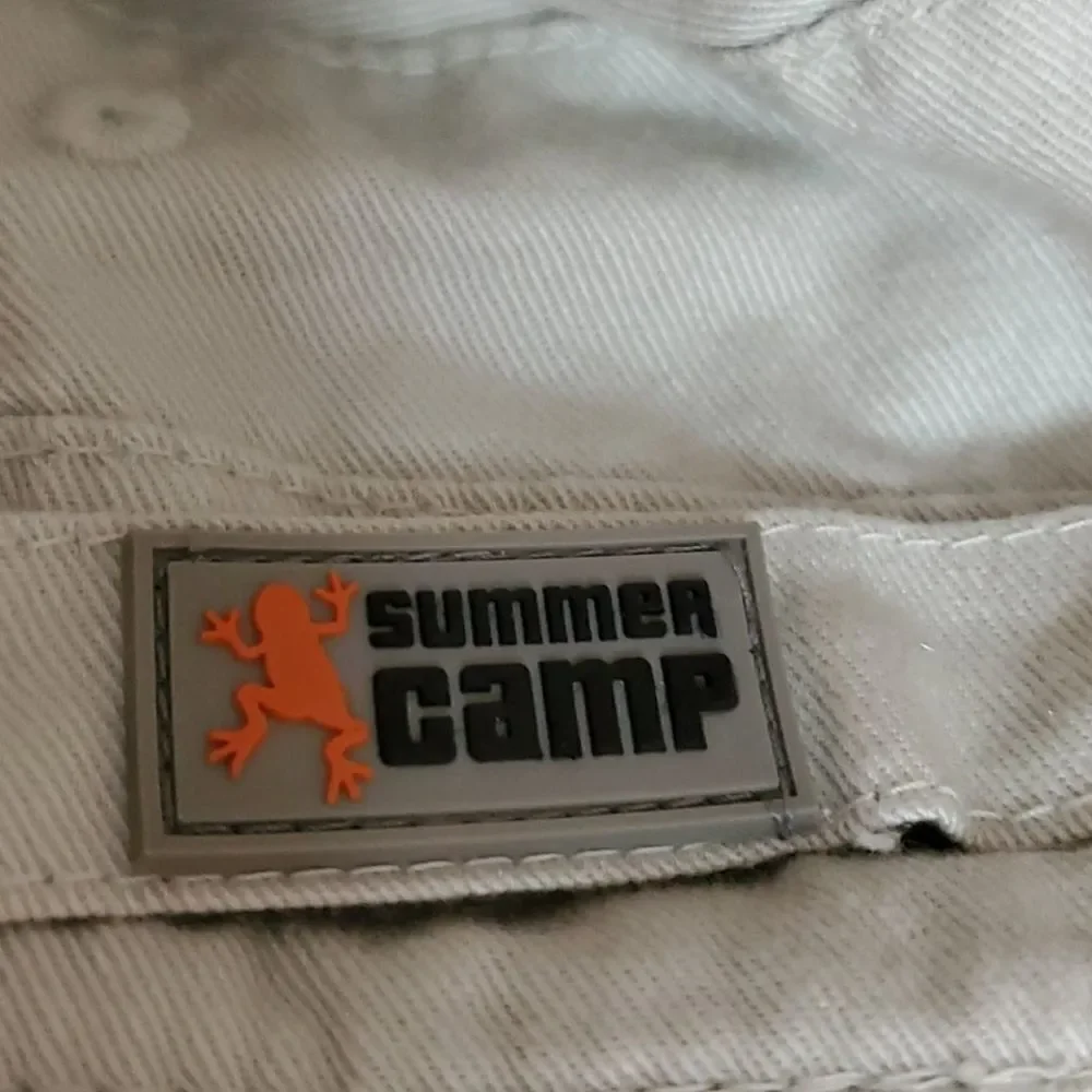 Cute little reversible hat,‎ by summer camp. Good used condition.